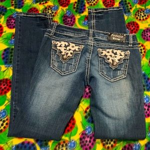 Antique Rivet Straight Leg Dark Washed Blue Jeans. Waist size 27, length 38.